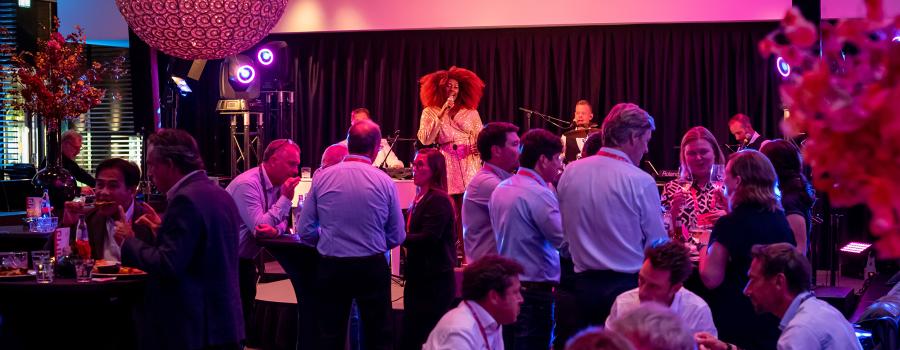 A live band performing during conference dinner